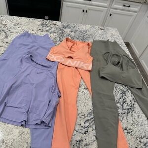 Nike Lavender peach and green bundle slight stain on the peach sports bra